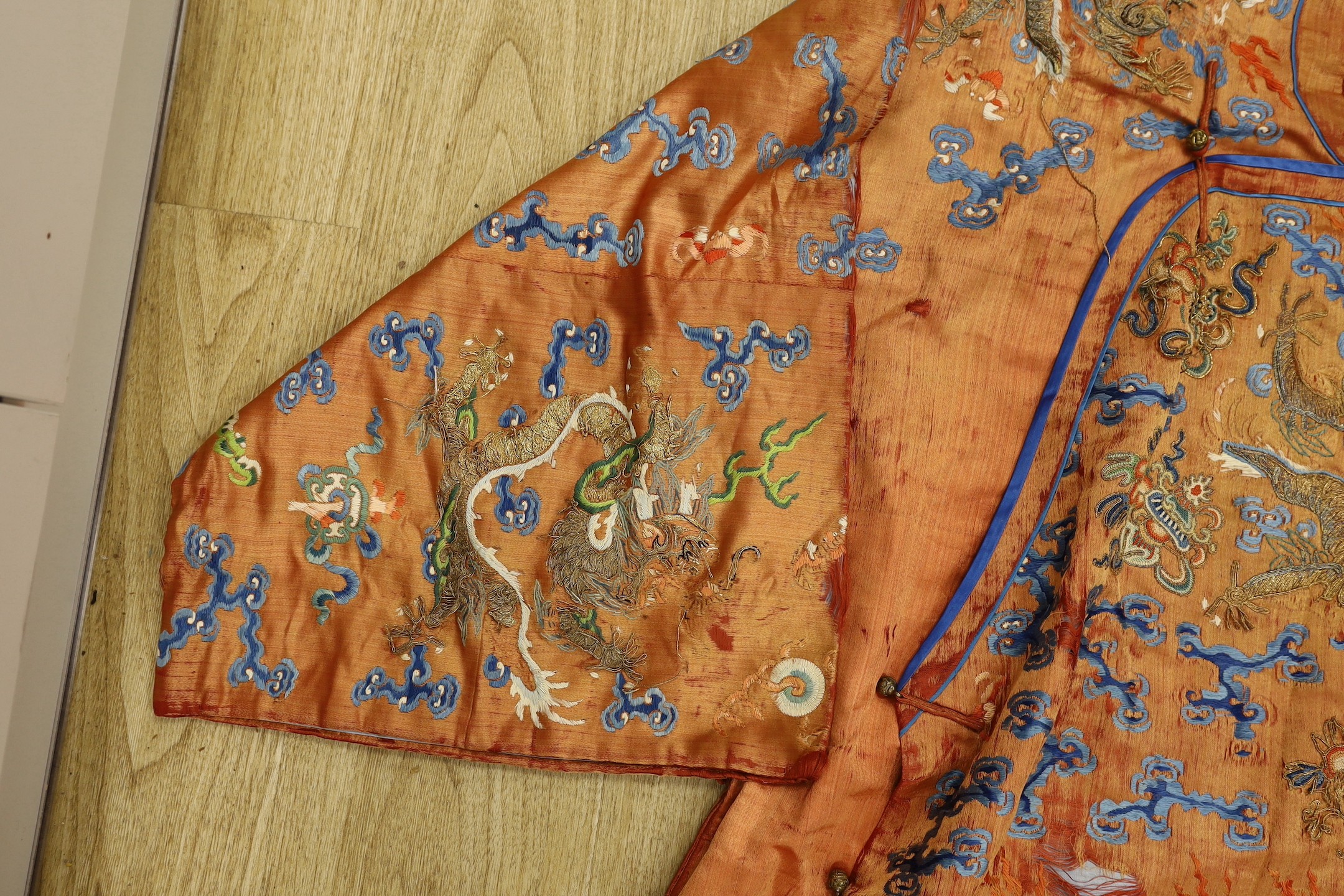 A Chinese embroidered silk dragon robe, late Qing Dynasty